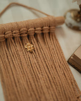 Mini ochre wall hanging