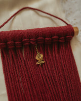 Mini red wall hanging
