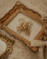 Vintage cross and faux pearl brooch