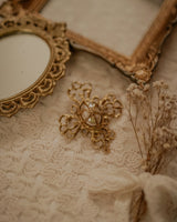 Vintage cross and faux pearl brooch